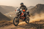KTM 390 Adventure R riding on a rocky Indian trail with off-road accessories and knobby tyres