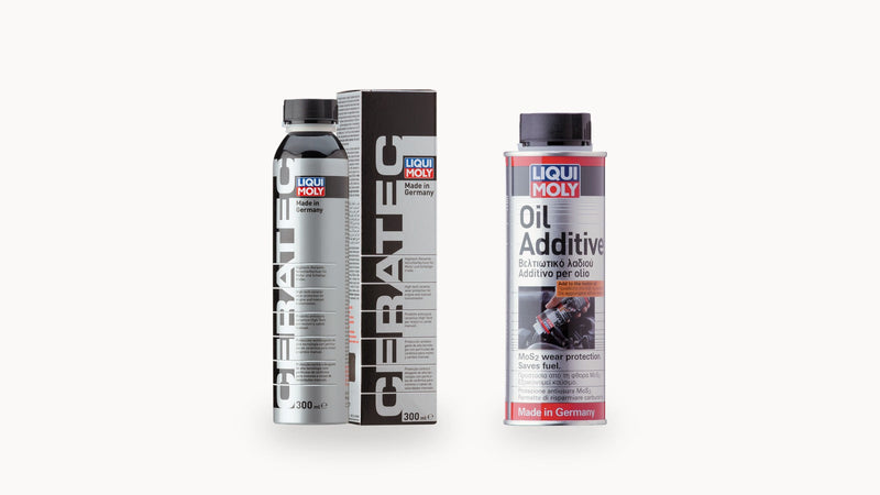 Liqui Moly Cera Tec 300 ml and MoS2 Oil Additive 200 ml side by side on a bone-white studio background