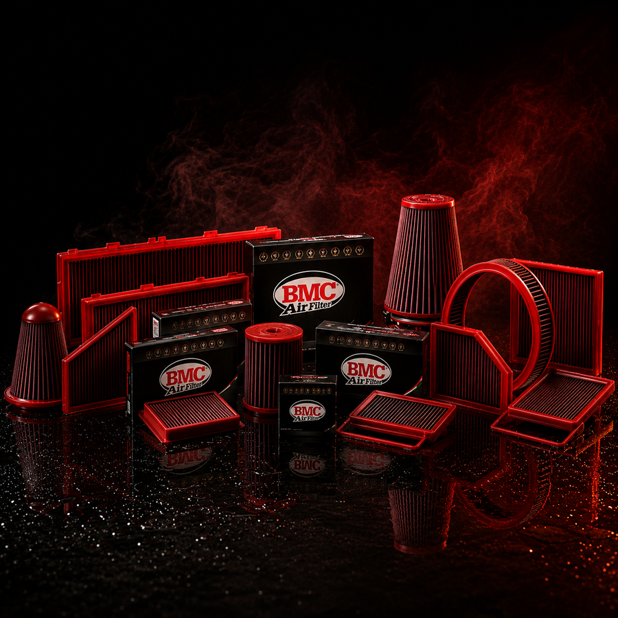 Collection of BMC air filters and components on a dark background with red lighting.