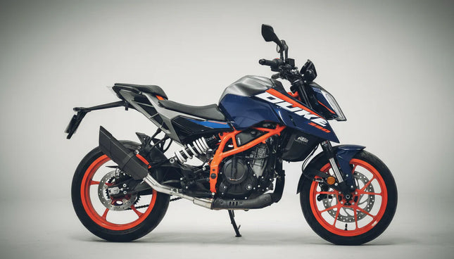 Stainless steel performance exhaust installed on KTM motorcycle