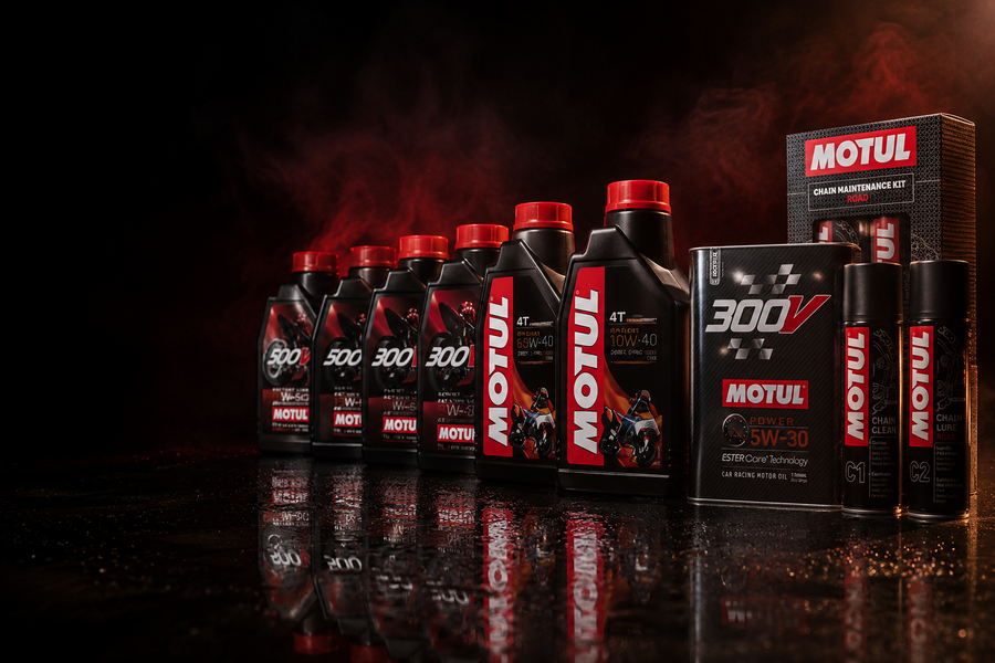 Collection of Motul oil bottles and packaging on a dark background