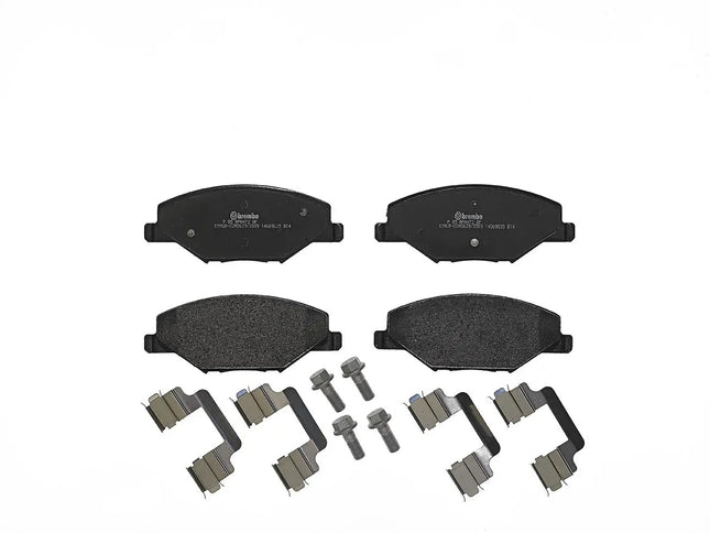 Brembo P85121 brake pads with fitting hardware, top view