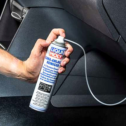 Liqui Moly A/C System Cleaner being sprayed into a car air-conditioning system