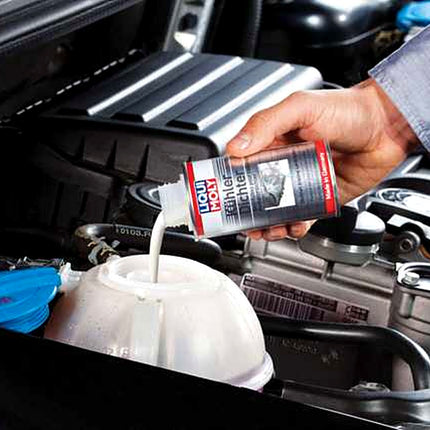 Liqui Moly Radiator Stop Leak being added to a cooling system