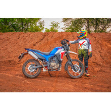 Hero XPulse 210 with Powerage slip-on exhaust, three-quarter view