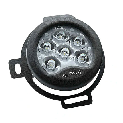 Maddog Alpha performance auxiliary lights for Mahindra Thar with OEM connectors, 9600 lumens brightness, and black aluminum housing.